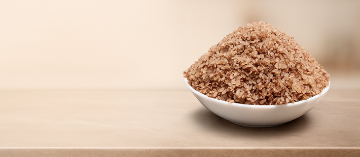 Bowl of Ofada brown rice grains used for Dry Grains & Legumes category banner, showcasing authentic African rice for cooking and meal preparation