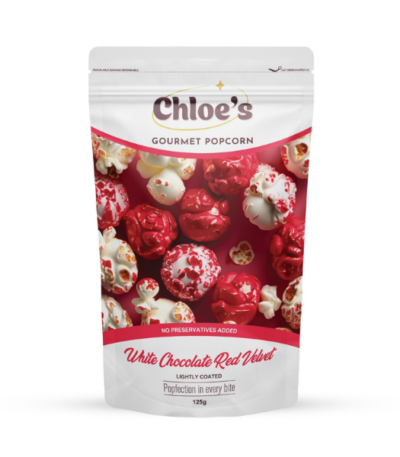 Gourmet white chocolate red velvet popcorn drizzled in smooth white chocolate and dusted with red velvet crumble.