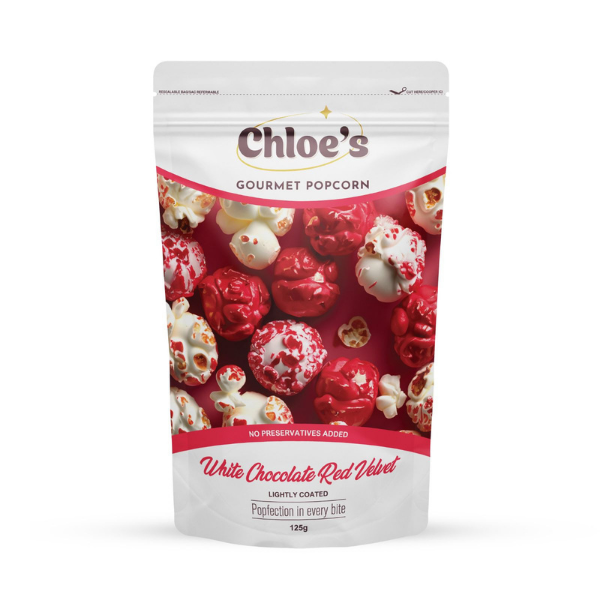 Gourmet white chocolate red velvet popcorn drizzled in smooth white chocolate and dusted with red velvet crumble.